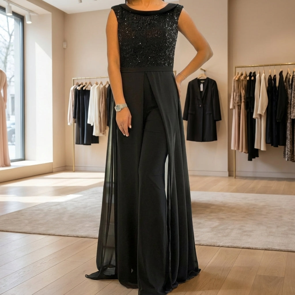 ✨ Mono Negro Elegante con Sobre Falda de Gasa y Detalle Brillante – Sofisticación que Impacta